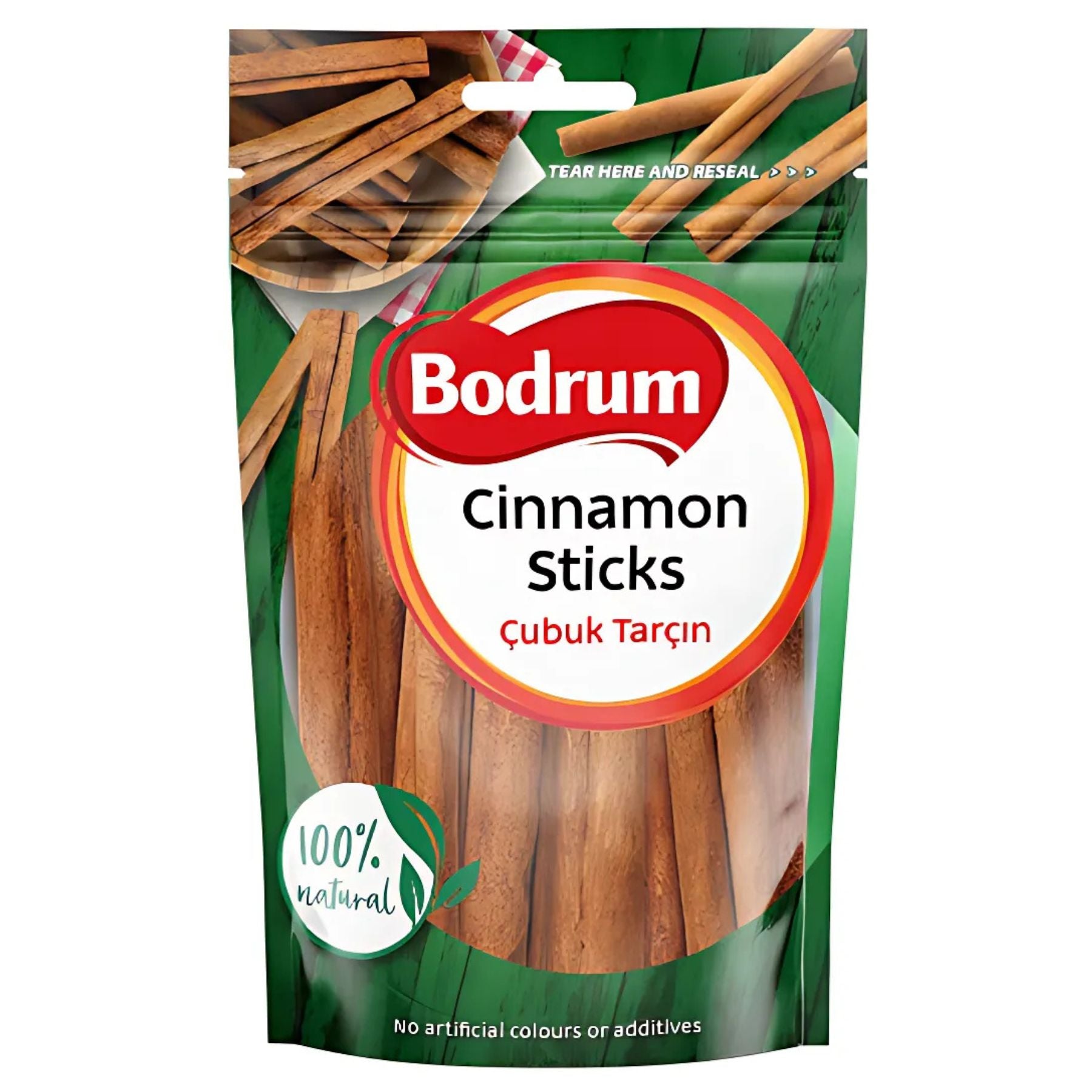 A green resealable pack of Bodrum - Cinnamon Quills - 50g, labeled "100% natural" and "No artificial colours or additives." Enjoy premium whole cinnamon quills in every pack. A green resealable pack of Bodrum - Cinnamon Quills - 50g, labeled "100% natural" and "No artificial colours or additives." Enjoy premium whole cinnamon quills in every pack.