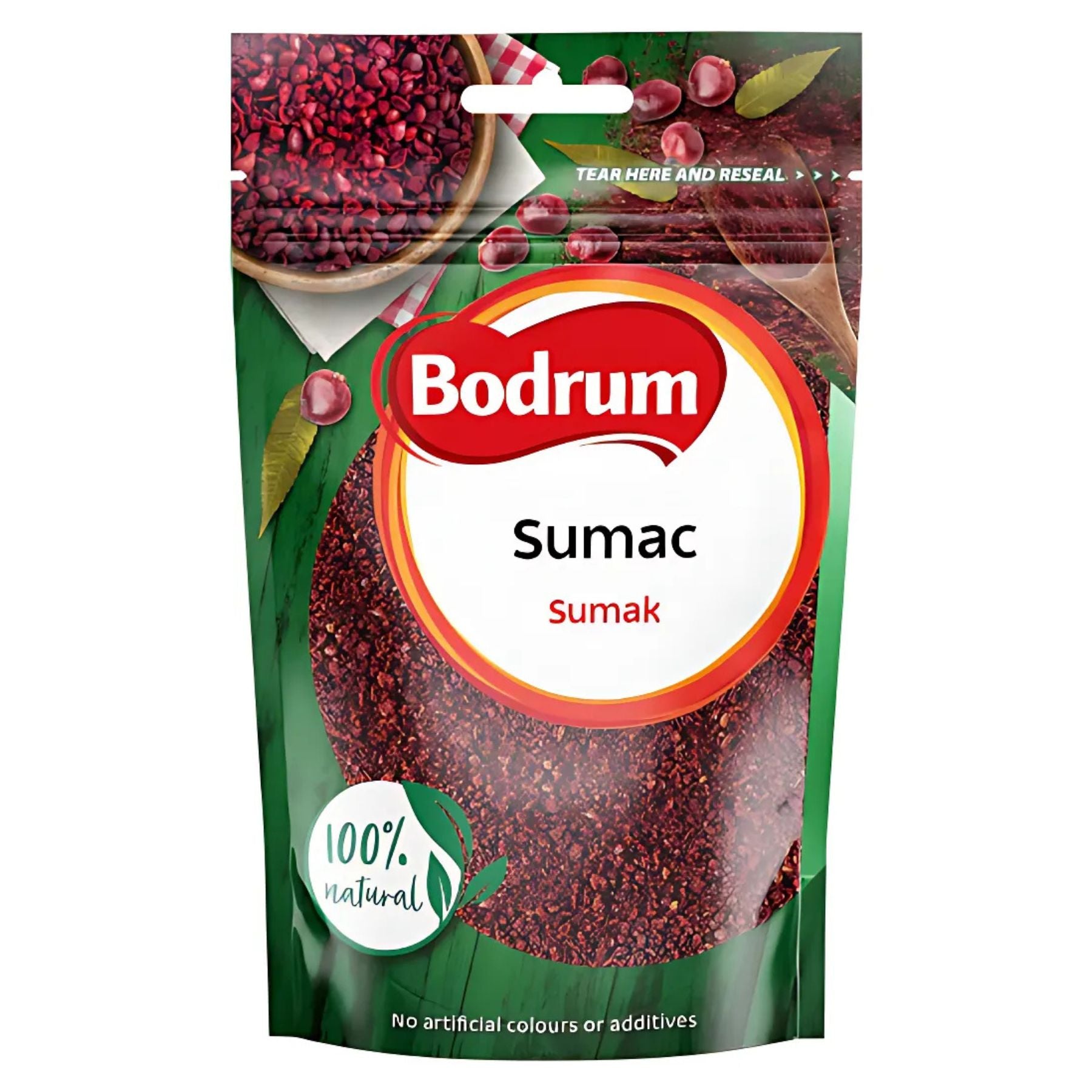 A 100g packet of Bodrum Sumac, a 100% natural spice with no artificial colors or additives, features sumac berries and leaves on the packaging and adds a tangy, citrus flavor to your dishes. A 100g packet of Bodrum Sumac, a 100% natural spice with no artificial colors or additives, features sumac berries and leaves on the packaging and adds a tangy, citrus flavor to your dishes.