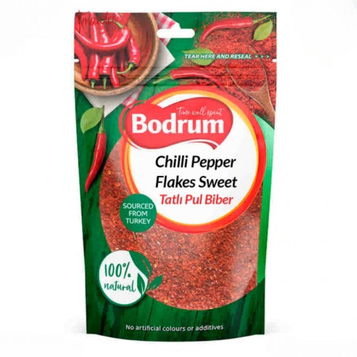 Package of Bodrum - Sweet Chili Pepper Flakes - 100g, labeled "sourced from turkey" and "100% natural colors or additives," with an image of chili peppers and flakes.