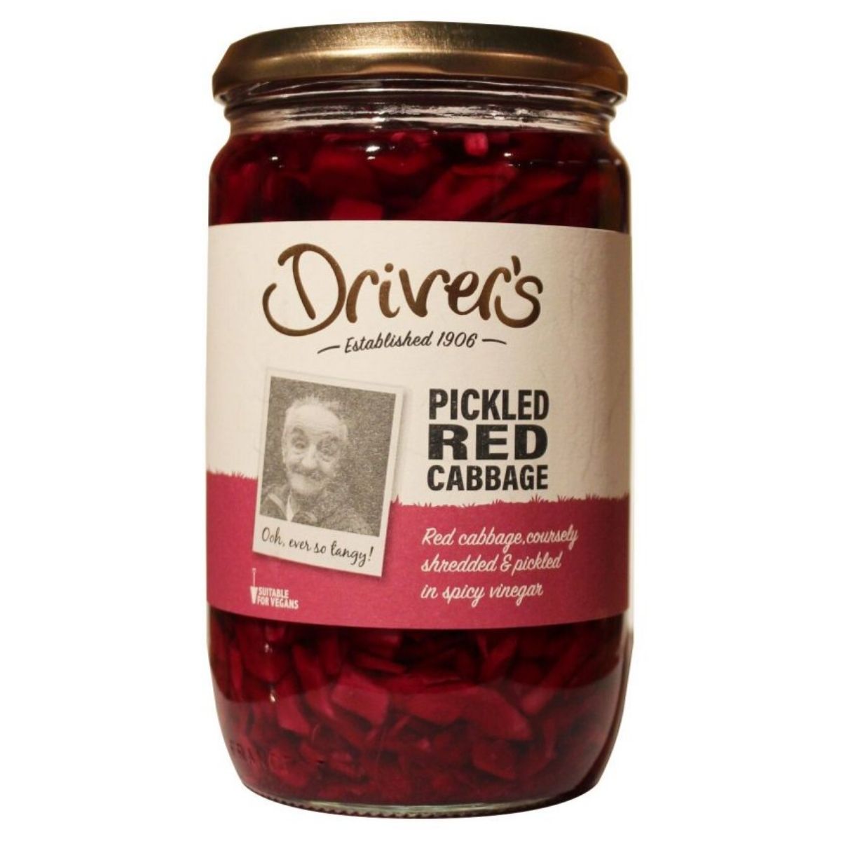 A 710g glass jar of Drivers Pickled Red Cabbage with a beige label, featuring product details and a black-and-white photo of a smiling elderly woman—ideal for pickled food enthusiasts. A 710g glass jar of Drivers Pickled Red Cabbage with a beige label, featuring product details and a black-and-white photo of a smiling elderly woman—ideal for pickled food enthusiasts.