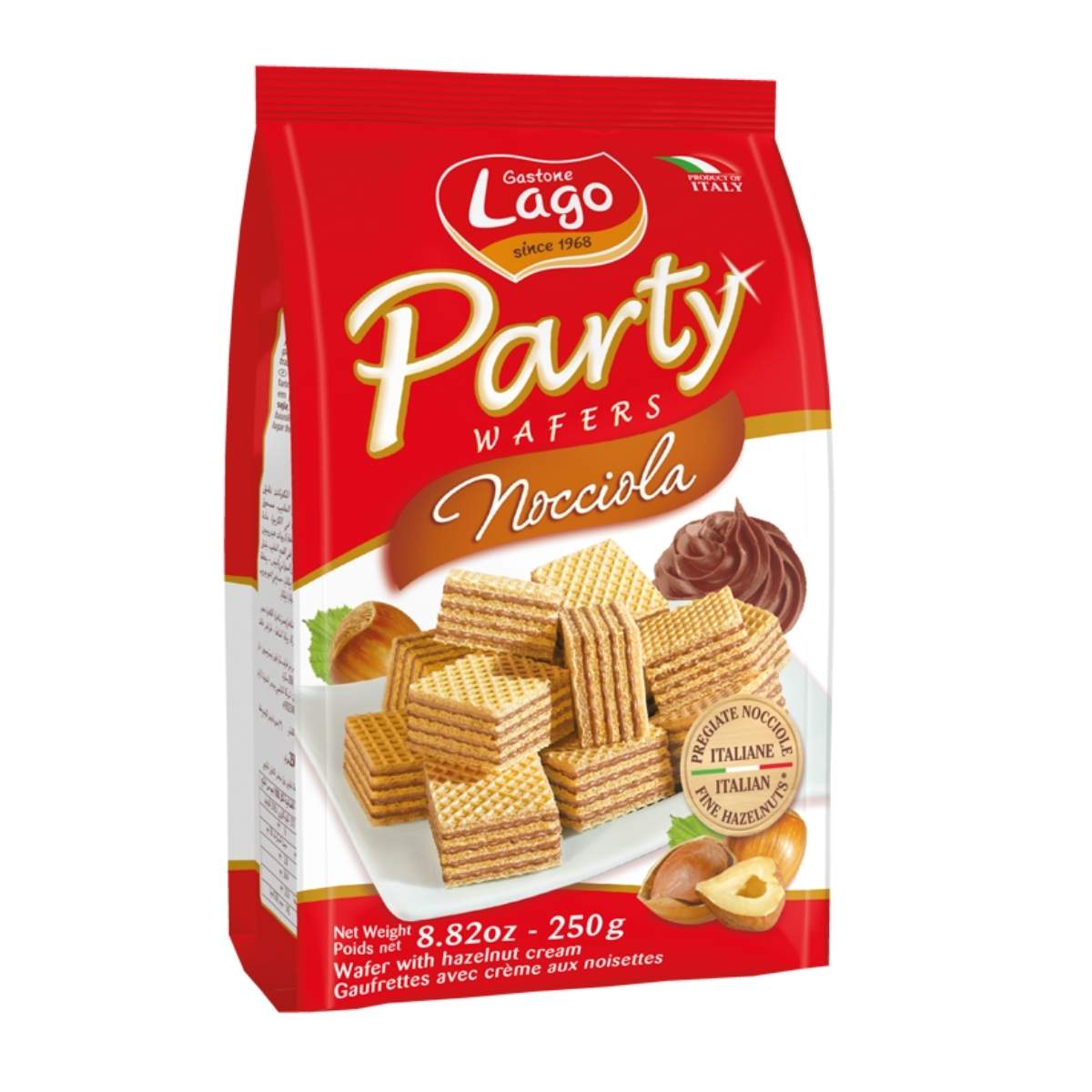 The packaging of Lago - Hazelnut Cream Wafers - 250g is designed with a striking red and white color scheme, featuring images of crisp wafers filled with luscious hazelnut cream alongside the tempting nuts. Weighing 8.82 oz (250g), these wafers offer the ultimate indulgent snacking dessert experience. The packaging of Lago - Hazelnut Cream Wafers - 250g is designed with a striking red and white color scheme, featuring images of crisp wafers filled with luscious hazelnut cream alongside the tempting nuts. Weighing 8.82 oz (250g), these wafers offer the ultimate indulgent snacking dessert experience.