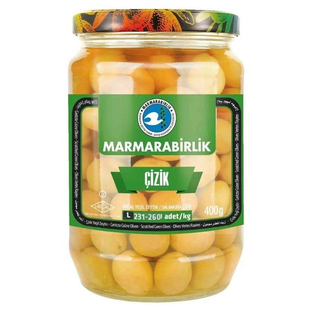 A 670g jar of Marmarabirlik Scratched and Pickled Green Olives, with a green and black label and whole green olives visible through the glass. A 670g jar of Marmarabirlik Scratched and Pickled Green Olives, with a green and black label and whole green olives visible through the glass.