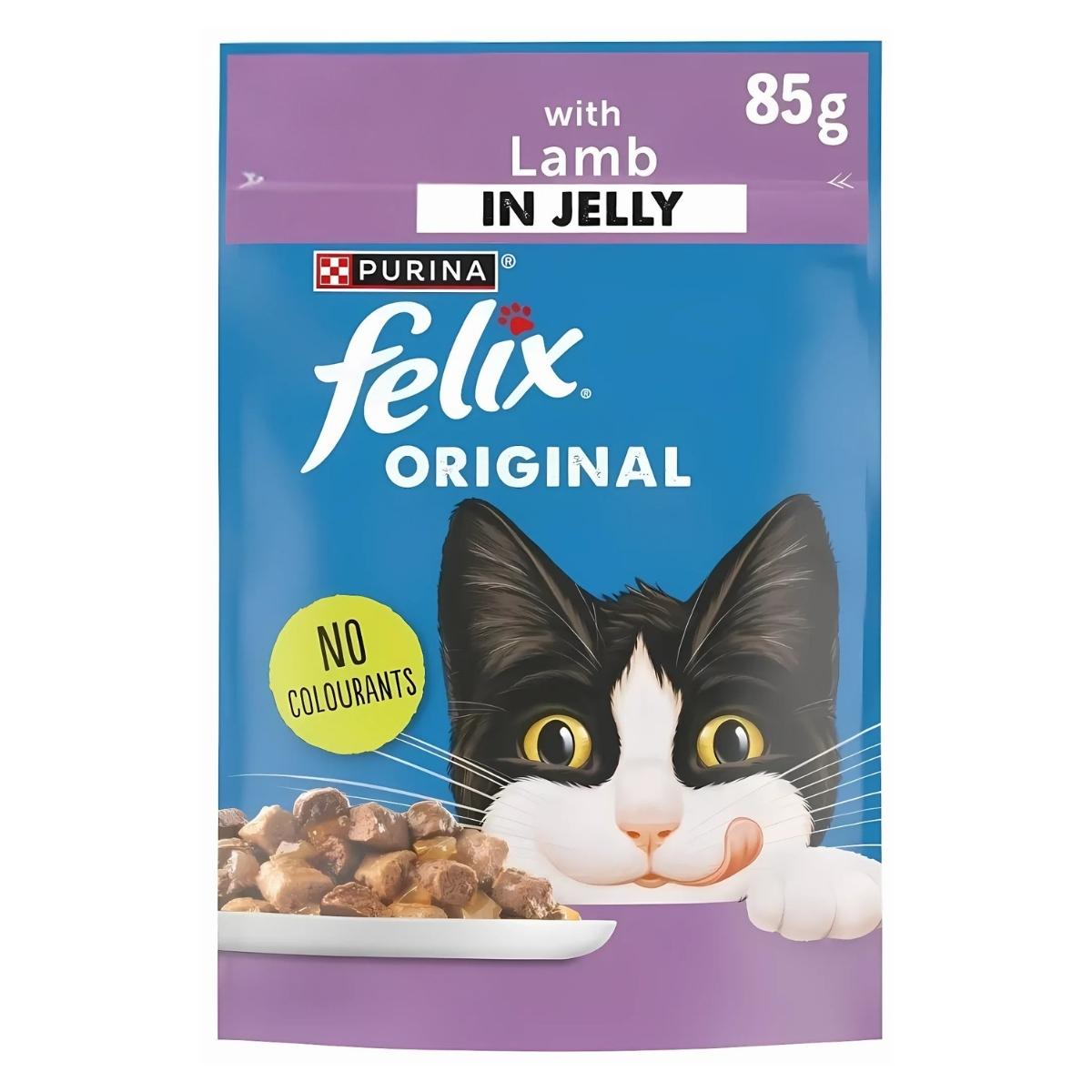 Purina's Felix Original Lamb in Jelly features a black and white cat peeking over the dish, with text highlighting "No colourants" and an 85g size for your feline's delight. Purina's Felix Original Lamb in Jelly features a black and white cat peeking over the dish, with text highlighting "No colourants" and an 85g size for your feline's delight.