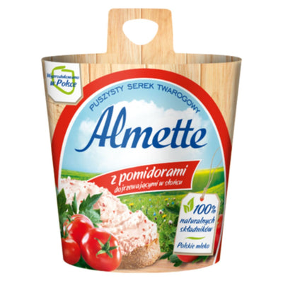 Almette - Spreadable with Tomatoes Fluffy Cottage Cheese (150g) is made from Polish milk and comes in a wooden-style container featuring images of tomatoes and cheesy bread on the label.