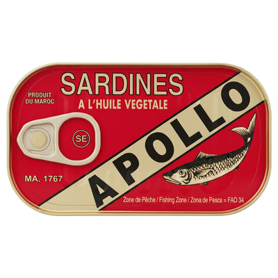 A rectangular tin of Apollo Sardines A L'Huile Vegetale on a plain white background. The label is predominantly red with a diagonal beige band featuring the brand name 'APOLLO' in bold black letters, alongside a black-and-white illustration of a sardine and a cream-colored pull-tab seal.