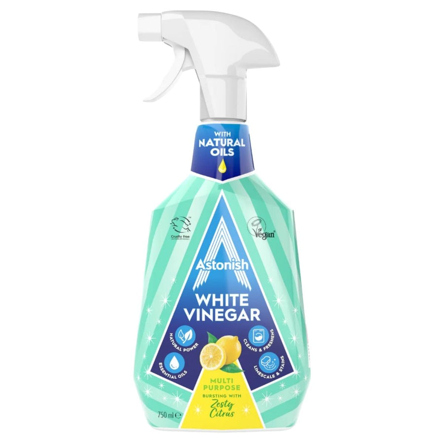 A 750ml bottle of Astonish Zesty Citrus White Vinegar, featuring a citrus-themed label.
