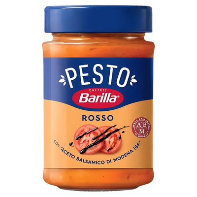 A 200g jar of Barilla Rosso Pesto with images of tomatoes and Balsamic Vinegar of Modena on the label, emphasizing its rich Mediterranean flavours and authentic balsamic vinegar from Modena.