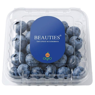 Enjoy sweet Beauties - Finest Blueberries (125g) in a clear plastic container with a blue circular label, perfect for convenient UK blueberry delivery.