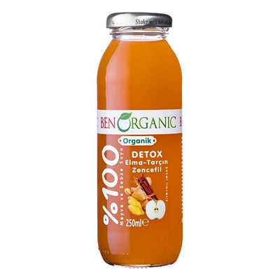 A 250ml bottle of BenOrganic - Organic Apple Cinnamon & Ginger Juice, featuring organic apple, cinnamon, and ginger flavors, with an orange liquid and a silver cap.
