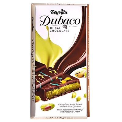 Beyoglu presents the Dubaco Premium Dubai Chocolate Bar, a 200g milk chocolate delight featuring kadayif and rich pistachio cream. Elegantly wrapped in white and brown packaging, it features a tempting illustration of these exquisite ingredients.