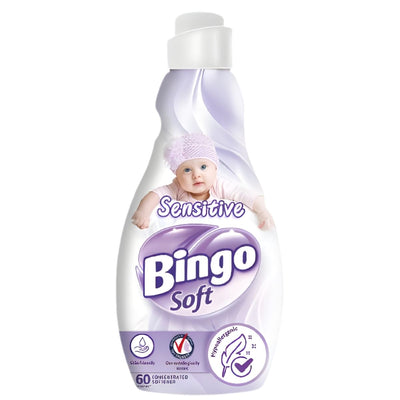 A white 1440ml bottle of Bingo Soft - Sensitive Fabric Softener (60 washes), featuring a baby image and labeled hypoallergenic and dermatologically tested—ideal for sensitive skin. Brand: Bingo Soft.