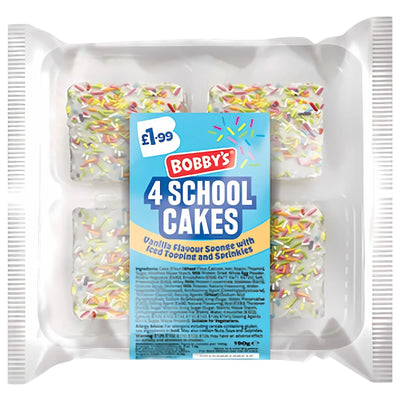 Bobby's - Vanilla Flavour Sponge School Cakes (4 Pack) feature iced topping and colored sprinkles. Ideal as a kids' snack, each pack costs £1.99.