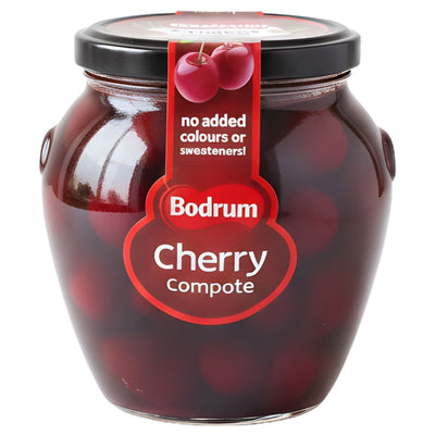 A 550g glass jar of Bodrum Cherry Compote with a black lid and a label noting no added colours or sweeteners, bringing authentic Turkish flavour from the Bodrum brand.