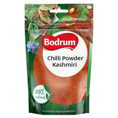 Bodrum Chilli Powder Kashmiri 100g offers moderate heat and vibrant color, is 100% natural, features spice images on the green and red pouch, and comes in convenient resealable packaging.