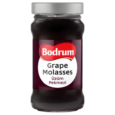A 380g glass jar of Bodrum Grape Molasses Jam, with a silver lid and white label featuring English and Turkish text.