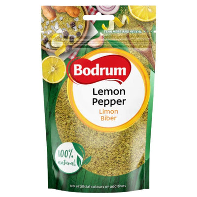 Bodrum Lemon Pepper packaging with lemon slices and ingredients in the background