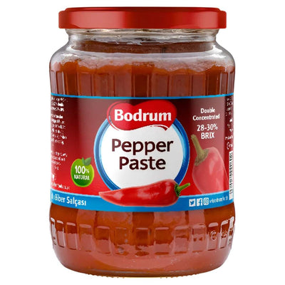Bodrum Mild Pepper Paste (700g) with red lid and label, made from high-quality peppers, features "Double Concentrated 28-30% BRIX 100% Natural." Ideal for marinades.