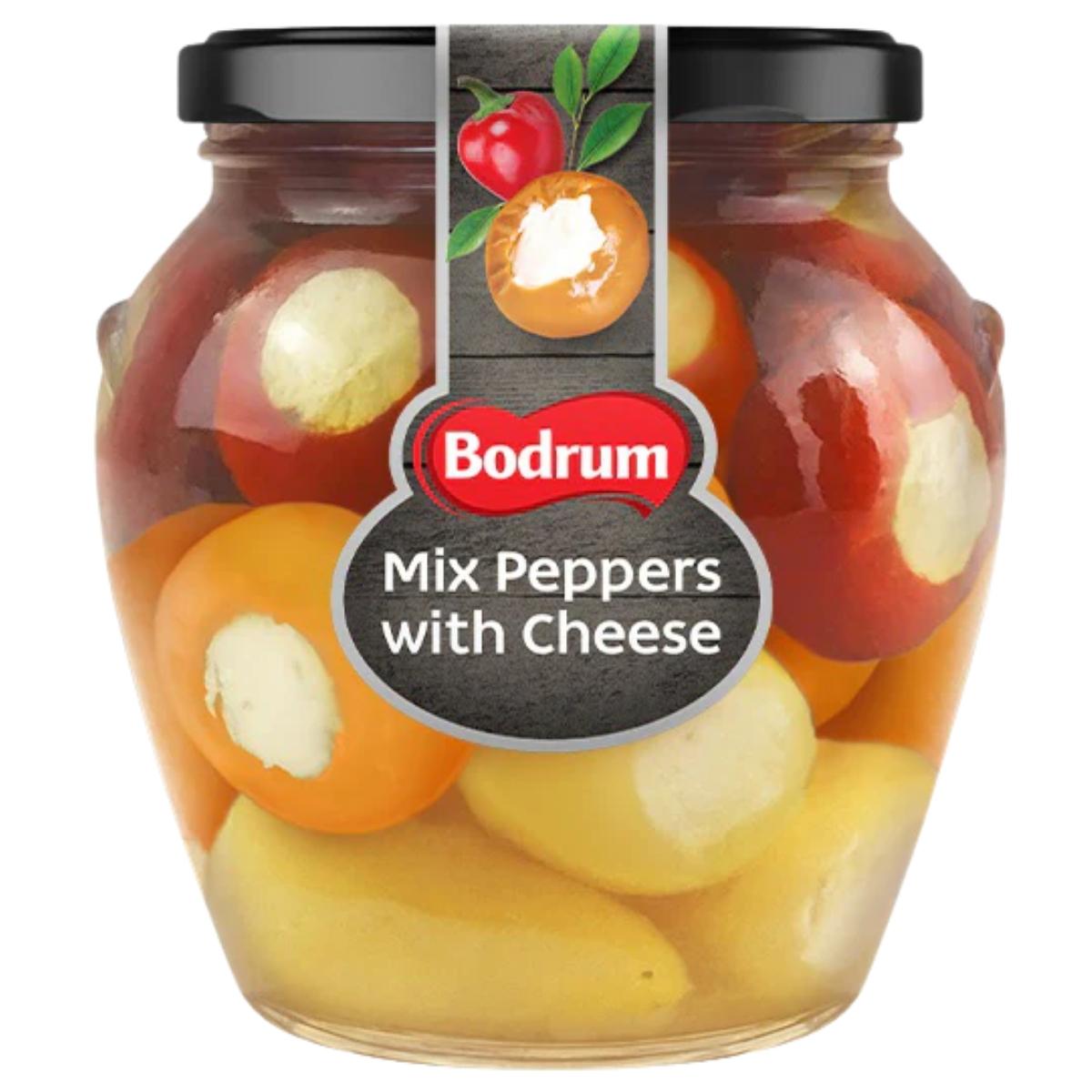 A 520g glass jar of Bodrum Mix Peppers with Cheese features assorted stuffed Mediterranean peppers in vibrant red, yellow, and orange, by Bodrum.