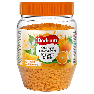 Bodrum - Orange Flavoured Instant Drink (300g) comes in a clear plastic jar with an orange lid, featuring images of oranges and vitamin C—ideal for preparing a refreshing instant beverage.