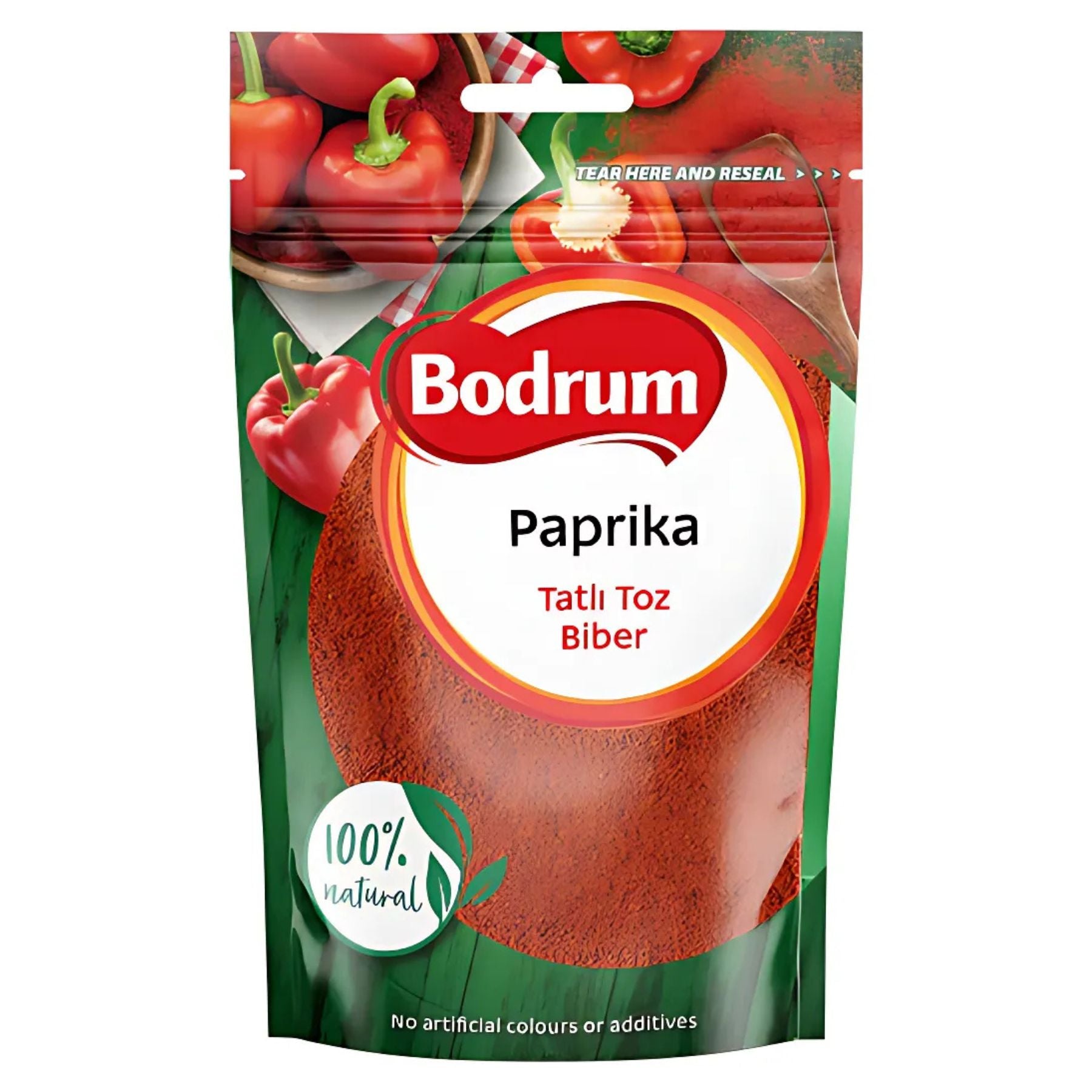 Bodrum Paprika Powder 100g, labeled "Tatlı Toz Biber," is made from red peppers and green leaves. It's 100% natural with no artificial colors or additives—an antioxidant-rich spice to enhance your dishes with vibrant flavor.