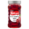 Bodrum Sour Cherry Jam 380g comes in a glass jar with a silver lid and a label in English and Turkish—enjoy this deliciously tart jam at breakfast or on desserts.