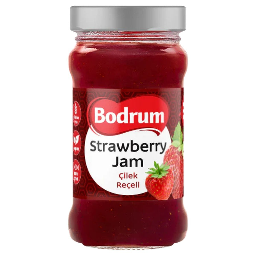 A 380g glass jar of Bodrum Strawberry Jam with a silver lid, red label, and images of strawberries on the front.