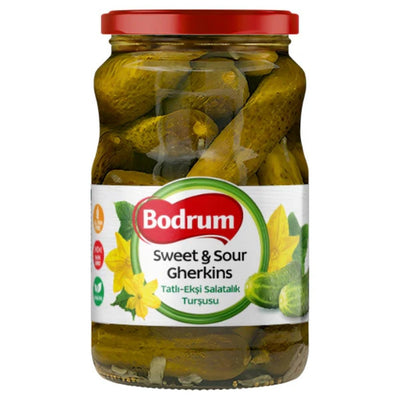 A 1650g jar of Bodrum Sweet & Sour Gherkins with a red lid, containing whole gherkins and clear Bodrum branding on the front.