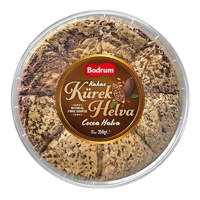 A round, segmented container of Bodrum Tahini Cocoa Kurek Halva (350g) with a brown label in Turkish and English—crafted by Bodrum for a rich sesame halva experience with premium cocoa.