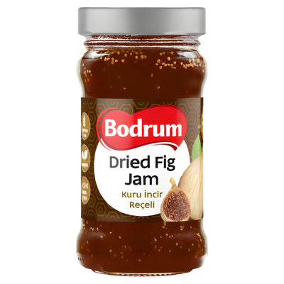 A 380g jar of Bodrum Dried Fig Jam with a silver lid and a label showing fig artwork and product details in English and Turkish.