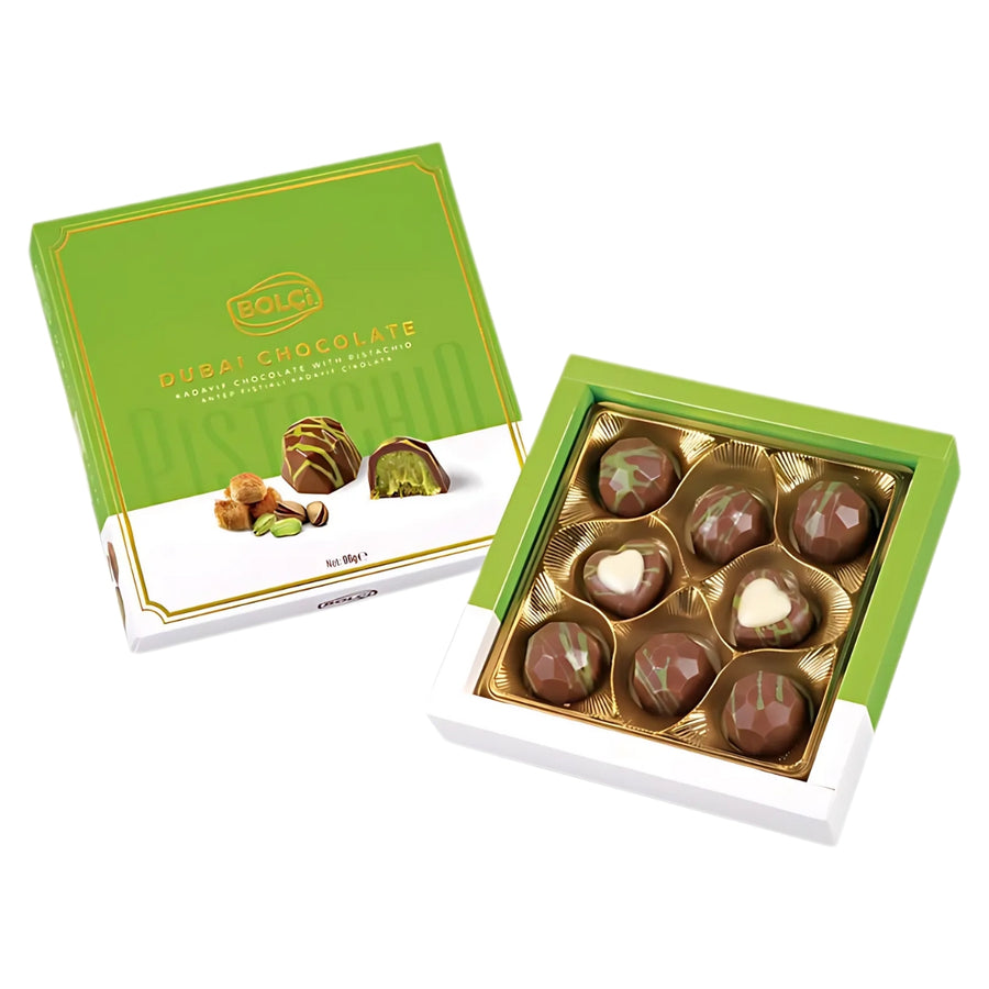 The Bolci Dubai Chocolate Gift Box unveils six luxurious chocolates in green and brown packaging. Nestled in a gold tray, these pieces feature heart and swirl designs with enticing kadayif and pistachio flavors.