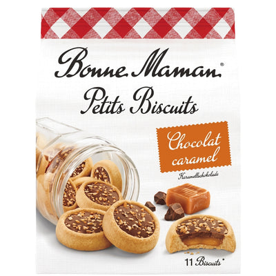A package of Bonne Maman - Chocolate Caramel Petits Biscuits (150g) is displayed, showcasing French chocolate cookies filled with rich chocolate and caramel, some scattered around and one enticingly partially eaten.