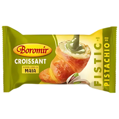 Boromir - Croissant With Pistachio Filling - 60g is a cream-filled pastry from Boromir, featuring green accents and an image of a pistachio croissant topped with creamy pistachio and nuts on the wrapper.