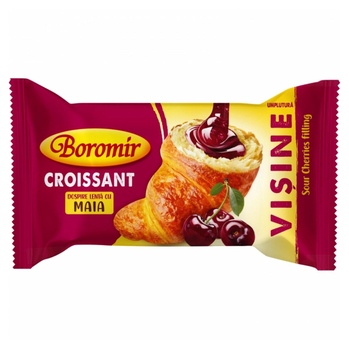 The Boromir - Croissant With Sour Cherry Cream Filling - 60g is perfect for an on-the-go breakfast, featuring a delightful filling and a wrapper displaying an enticing croissant with vibrant cherries.