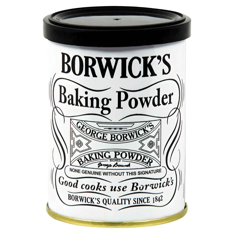 A 100g cylindrical tin of Borwicks Baking Powder features a white label with black text and a decorative design, emphasizing this classic ingredient's quality since 1842.