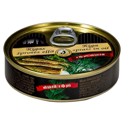 Brivais Vilnis - Riga Sprats in Oil with Taste of Dill (112g) comes in a pull-tab can with smoked sprats and dill on the label, plus multilingual text, offering the unique Baltic flavor of sprats with dill.