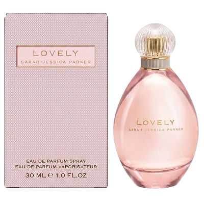 A 30 ml bottle of Sarah Jessica Parker - Lovely Eau de Parfum is displayed beside its soft pink box, reflecting the sophistication of this signature fragrance. The scent enchants with its elegant composition, and the label highlights key ingredients like alcohol denat.