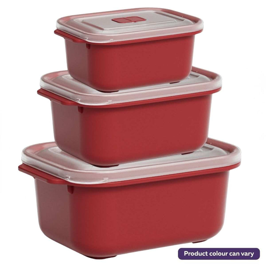 Set of three red food storage containers with clear lids on a white background
