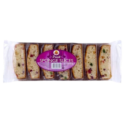 A clear plastic package labeled "Cake Zone - Fruit Sponge Slices - 210g" contains eight moist sponge cake slices with candied fruit pieces.