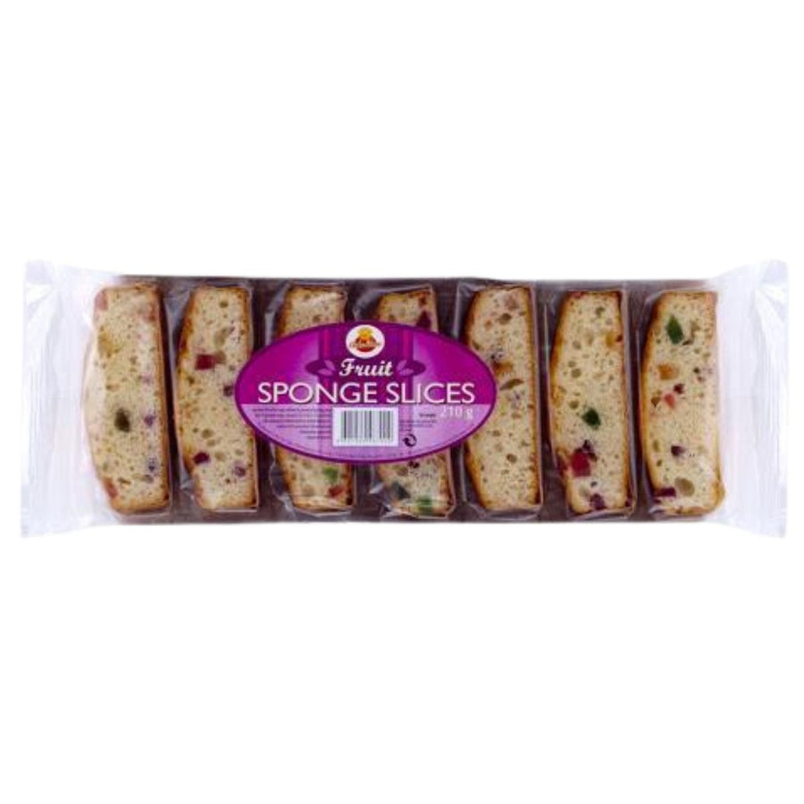 A clear plastic package labeled "Cake Zone - Fruit Sponge Slices - 210g" contains eight moist sponge cake slices with candied fruit pieces.
