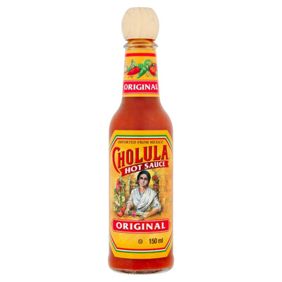 Bottle of Cholula hot sauce with a colorful label on a white background