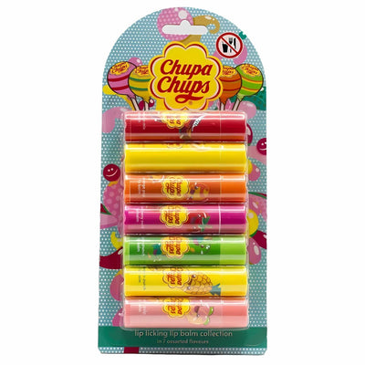 The Chupa Chups Lip Licking Lip Balm Collection features seven fruity flavors in assorted colors, perfect for lip care, all presented in branded packaging.