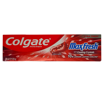 Colgate MaxFresh Spicy Fresh 100ml toothpaste features “with cooling crystals” and “10x longer lasting cooling” on bold red packaging for a spicy fresh experience.