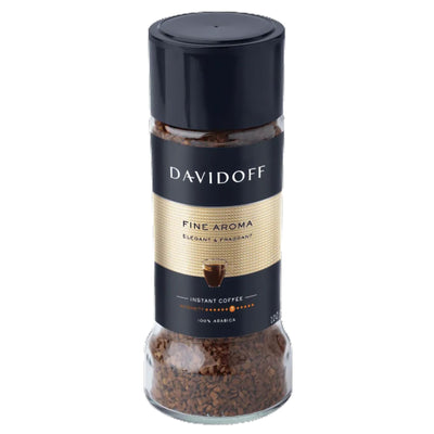 A 90g jar of Davidoff Fine Aroma Instant Coffee with a black lid and gold label, featuring a coffee cup graphic and 100% Arabica coffee.