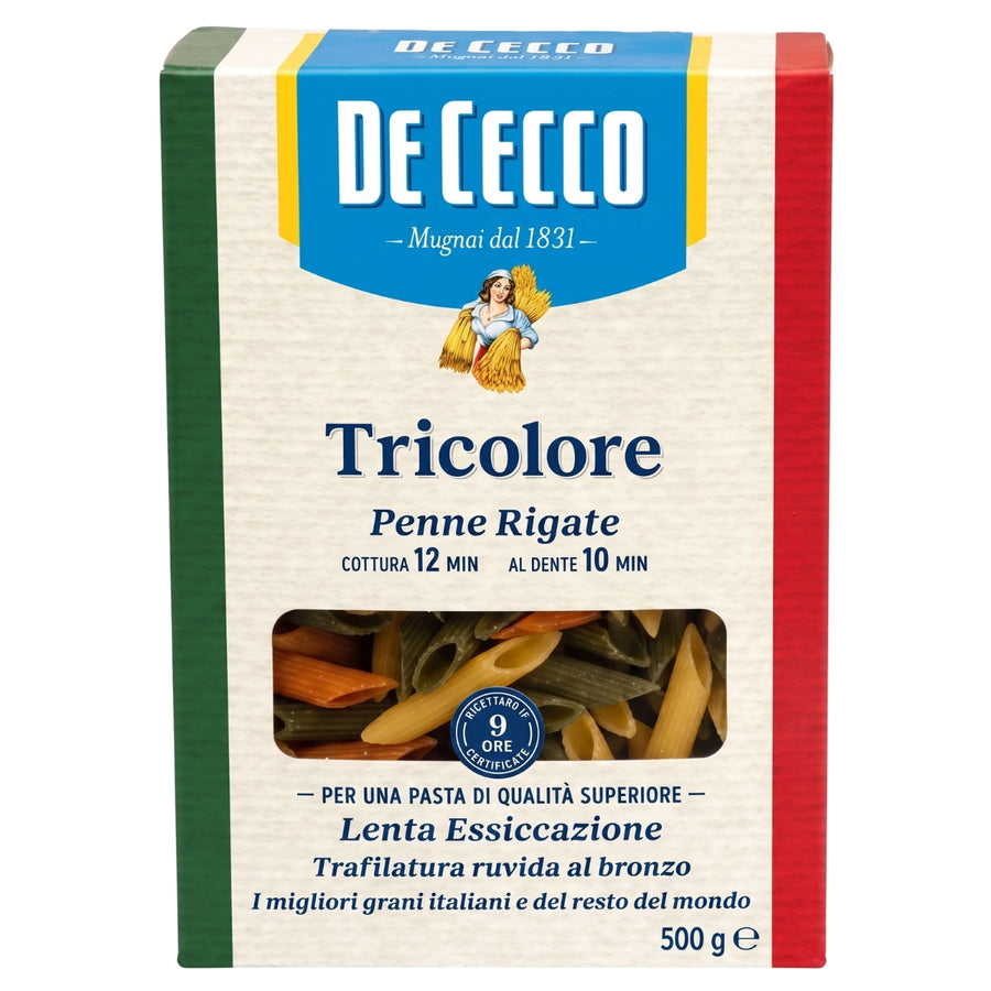 A 500g package of De Cecco Tricolore penne rigate pasta, featuring the brand's signature blue, green, and red vertical stripes on a cream-colored background with a clear window showing the pasta inside.