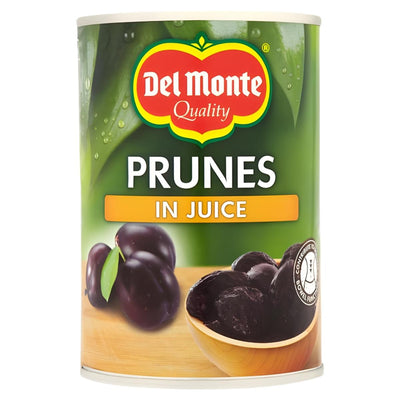 A 410g can of Del Monte Prunes in Juice features prunes and the Del Monte logo on a green label—an excellent source of dietary fibre.