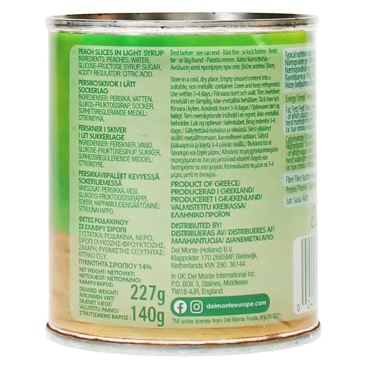 A 227g can of Del Monte Peach Slices in Light Syrup with multilingual ingredient and nutrition information displayed on the back label.