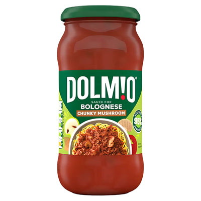 A 450g jar of Dolmio Chunky Mushroom Bolognese Sauce with a green lid and label, pictured served over pasta, offers a hearty, meat-free option for your meals.