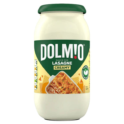 Jar of Dolmio creamy lasagne sauce on a white background