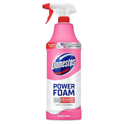 A 450ml bottle of Domestos - Floral Burst Power Foam Toilet Cleaner features pink and white packaging, a red spray nozzle, and powerfully removes limescale to keep your bathroom fresh and spotless.