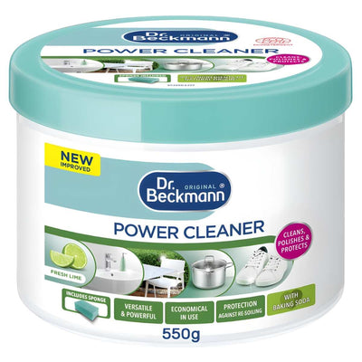 Dr. Beckmann Power Cleaner 550g tub with green lid features product labels highlighting a fresh lime scent, stainless steel cleaning versatility, and includes a sponge.